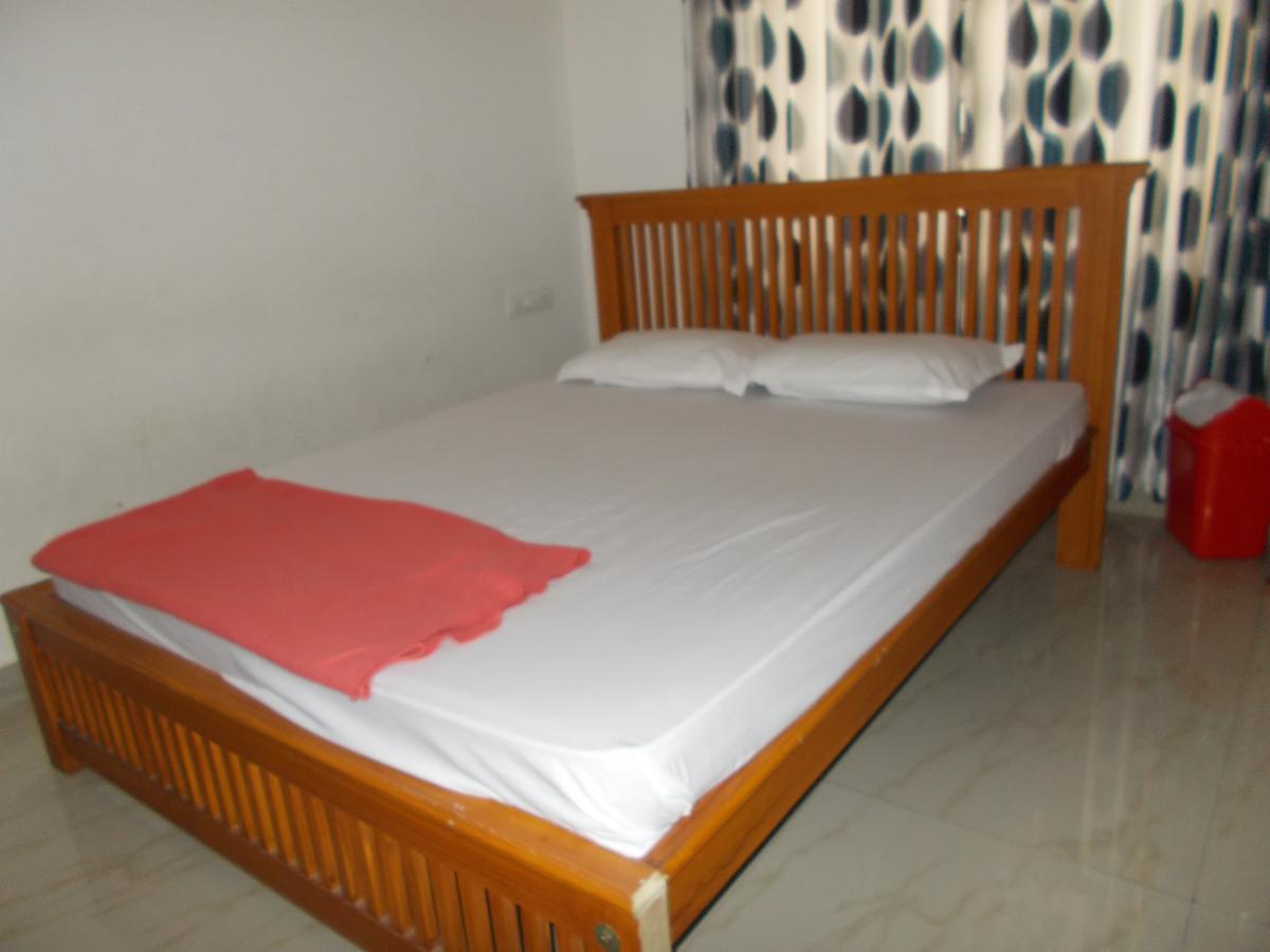 Sathya Inn กูรูวาเยอร์ ภายนอก รูปภาพ